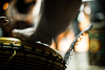 Played by blurred non recognizable percussionists musician. Fast hands playing on the drum....