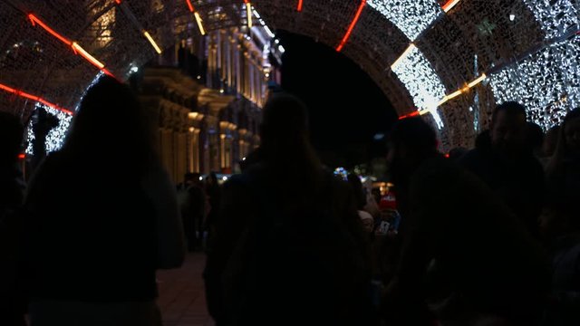 Aguascalientes, Mexico. 12/12/2019. Time lapse night video of Christmas attraction of tunnel lights in Aguascalientes Mexico. Great and young admiration.