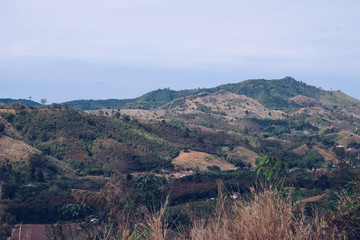 Fototapeta premium Unseen in Thailand. Skyscape view from the mountain. Wide angle point to view the mountain range and dramatic sky.