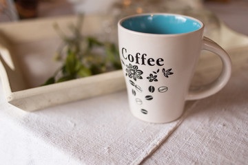 Obraz na płótnie Canvas white mug with Coffee inscription