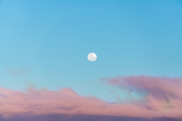 Naklejka na ściany i meble Moon and clouds in the evening