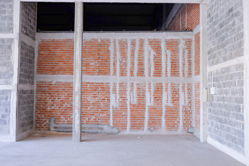 Interior construction of warehouse concrete wall. interior of unfinished residential complex with concrete walls. Empty buildings