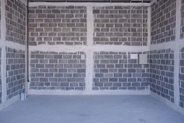 Interior construction of warehouse concrete wall. interior of unfinished residential complex with concrete walls. Empty buildings