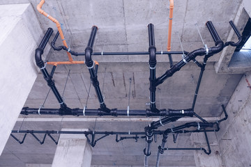 Water pipe engineering, clean line watering transport system in the building. Water pipe system. Construction work.Installation of water pipes in the building.Water pipe system within the building.