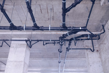 Water pipe engineering, clean line watering transport system in the building. Water pipe system. Construction work.Installation of water pipes in the building.Water pipe system within the building.
