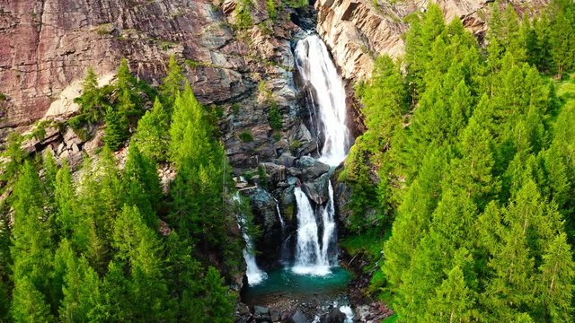 amazing big waterfall filmed by drone backward fly