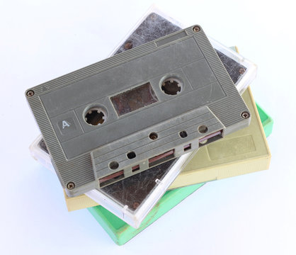 Stack Of Old Cassette Tape On White Background