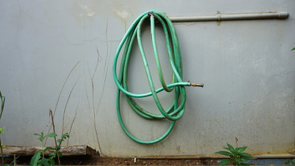 150 Water tap garden hose water meter hanging on the wall