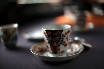 A beautifully decorated ancient porcelain flower tea cup