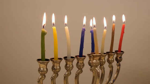 Jewish Chanukiah with burning candles celebrating the Hanukkah holiday