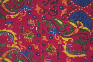 Close up of colorful fabric embroidery texture background