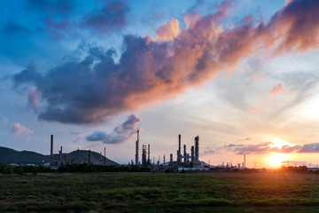 Oil refinery plant with stunning sunrise sky