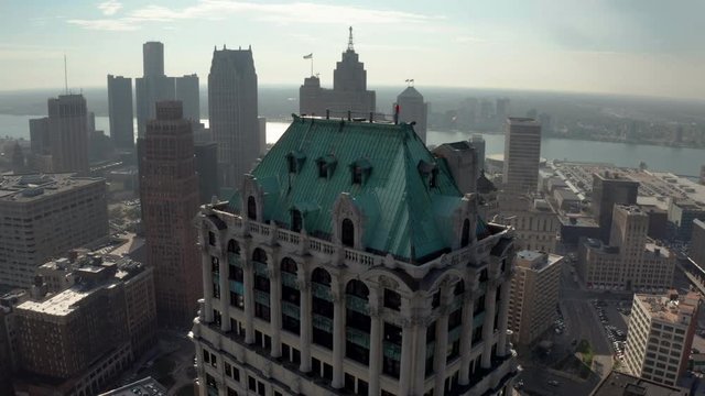 Detroit City Reveal Behind Rising Aerial Book Tower