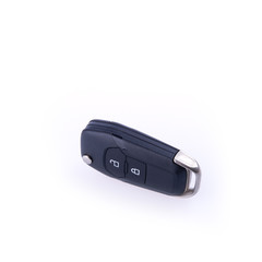 key or car key with remote on background.