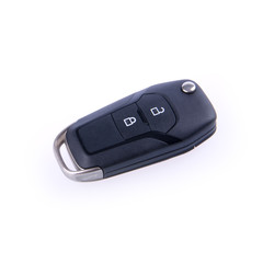 key or car key with remote on background.