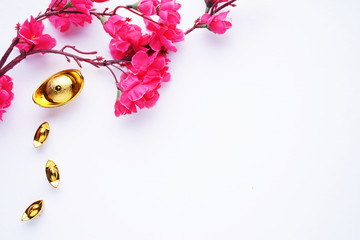 Chinese New Year flat lay white background with assorted festival decorations. Chinese characters...