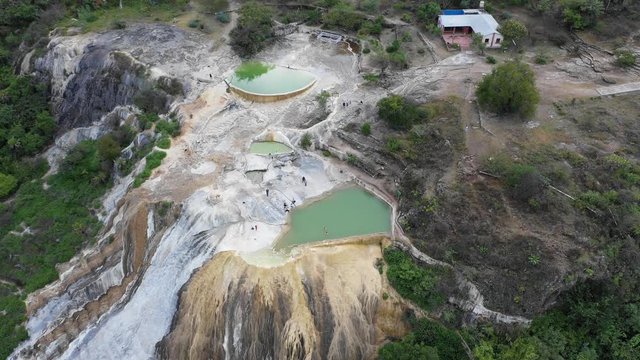 Aerial tilt down shot of Hierve el Agua ponds in Mexico