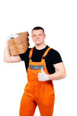 Parcel delivery man smiles at customer. The man in overalls. Is isolated.