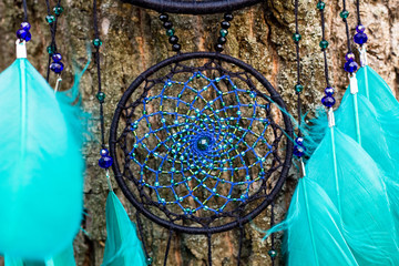 Handmade dream catcher with feathers threads and beads rope hanging