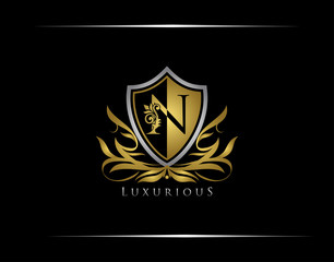 Obraz premium Golden N Luxury Shield Logo Design