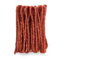 long and thin sausages kabanos on white background, isolated
