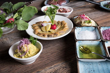 cooked fish and various appetizers