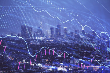 Financial graph on night city scape with tall buildings background double exposure. Analysis concept.