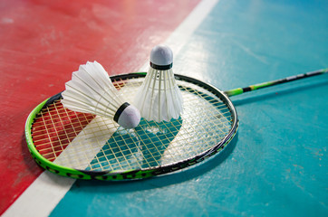 Shuttlecock on badminton court, soft focus image