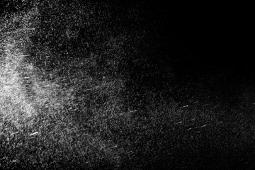 Water spray with black background