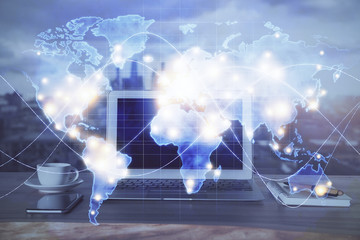 Multi exposure of business theme icons and work space with computer background. Concept of success.