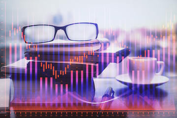 Financial graph hologram with glasses on the table background. Concept of business. Double exposure.