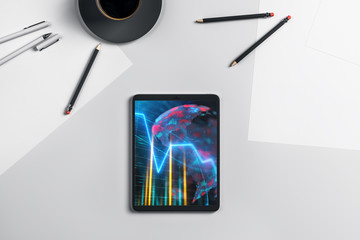 Digital tablet closeup top view with financial graph and partial world map on screen. Online international trading application concept. 3d rendering.
