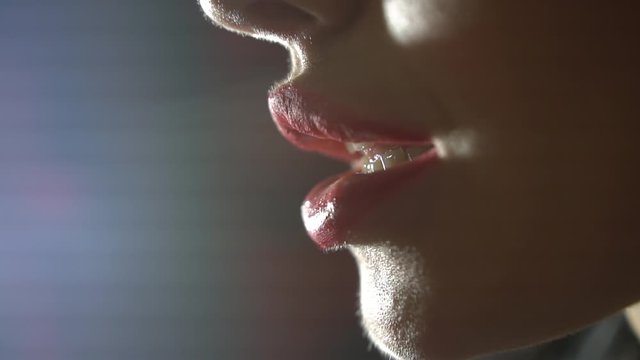 a very beautiful woman slightly bitting her lower lip