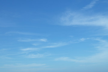 Naklejka na ściany i meble Beautiful tiny white clouds with blue sky in winter seasonal.