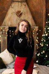 Studio photo of girl in Christmas scenery