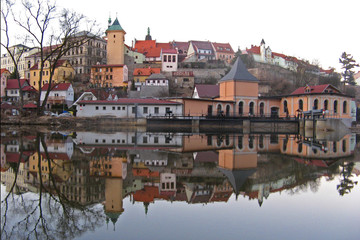 Loket historic medieval town mirroring in river, Czech Republic