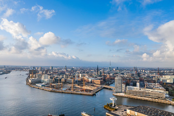 Aerial drone view of Port of Hamburg near Hafencity after storm with blue sky