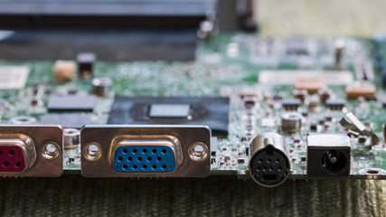 Computer connectors on motherboard pulled from laptop.