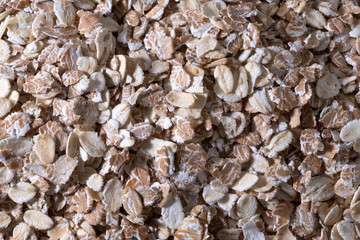 rolled oat. oat flakes photo. oat background. Top view closeup.