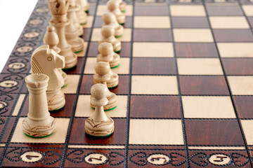 Chess. chessboard with figures made of wood