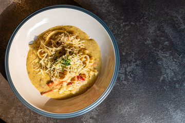 Pasta white cream sauce with steamed lobster