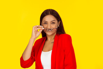 woman touching holding eyeglasses smiling