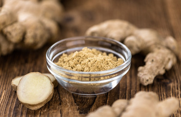Some fresh Ginger Powder (selective focus; close-up shot)