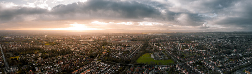 Beautiful Aerial Panorama of Chester at sunset in, Cheshire, UK. Christmas Day December 2019, showing residential buildings and a cloudy sky - obrazy, fototapety, plakaty