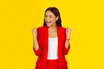 woman pumping fists in happiness,