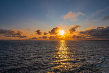 Sunset over the sea in westernmost part of Iceland, named Latrabjarg. Aerial drone view, september 2019