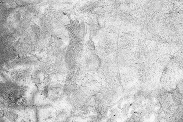 Obraz premium Texture of a concrete wall with cracks and scratches which can be used as a background