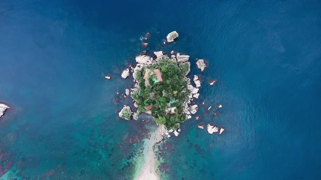 Aerial footage of Isola Bella, Taormina Italy. Amazing island, pure blue water