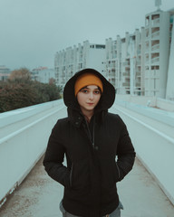 Woman with jacket and hat in cold winter day 