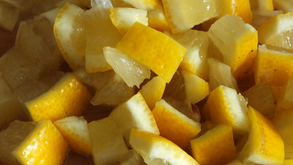  macro image of finely chopped yellow juicy lemon